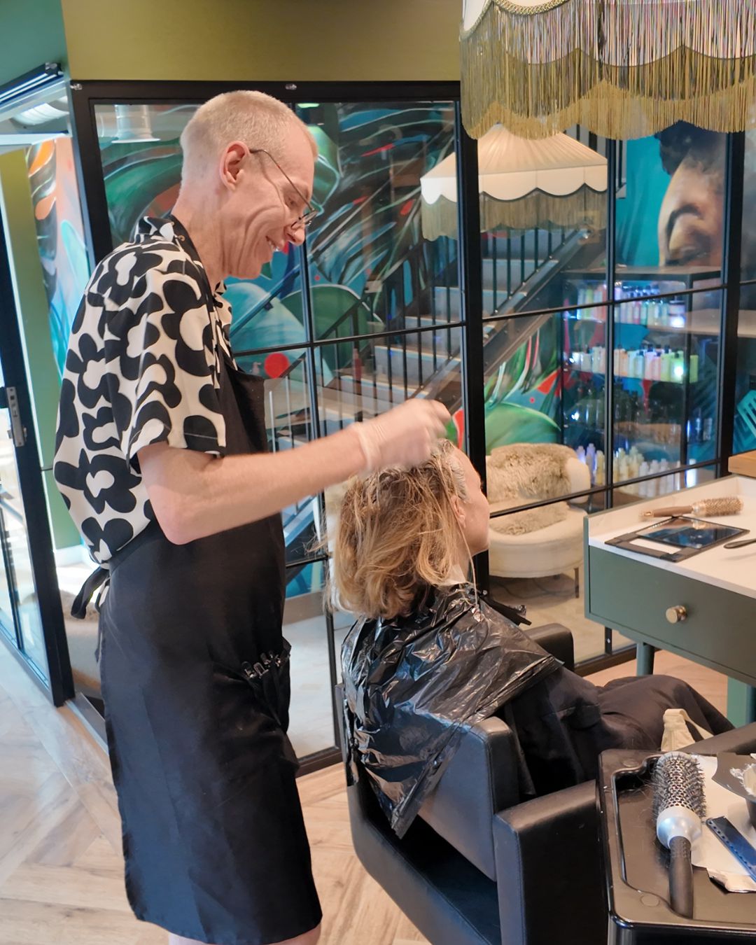 A stylist at work at Base Kamp